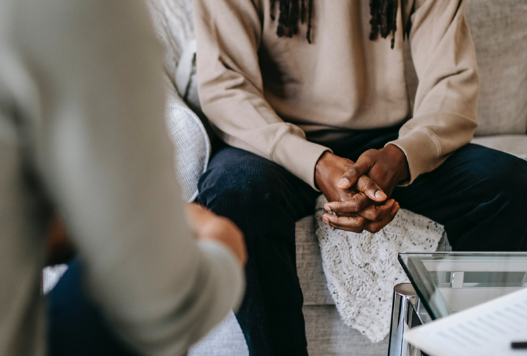 A man speaking with a therapist.