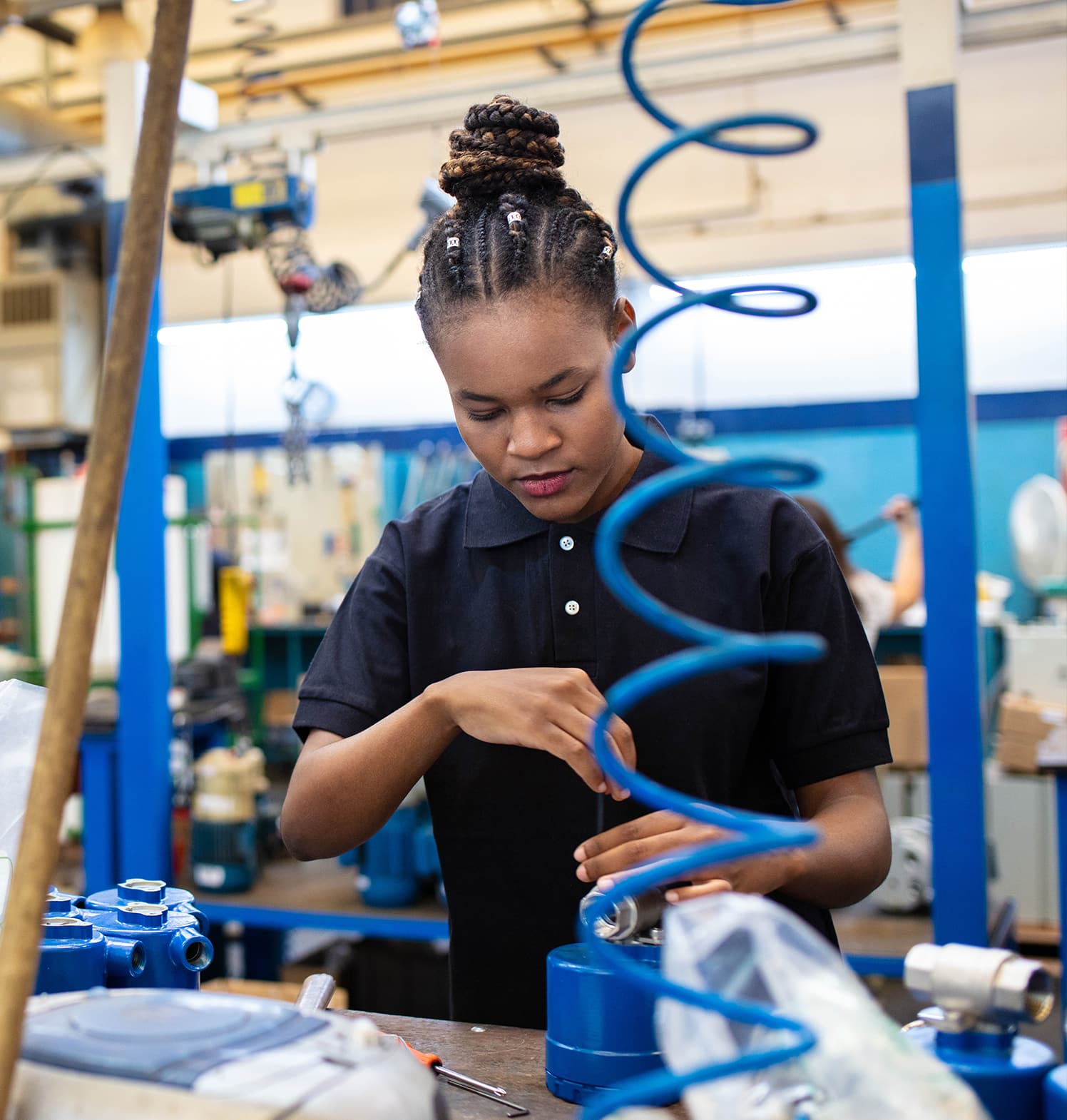 People working in a factory.